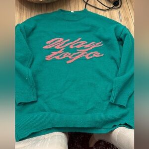 Woman’s Green Sweater